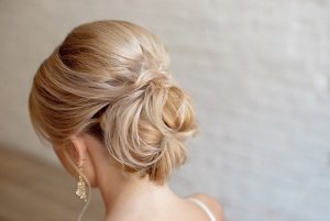 Blonde bride with chignon hairstyle